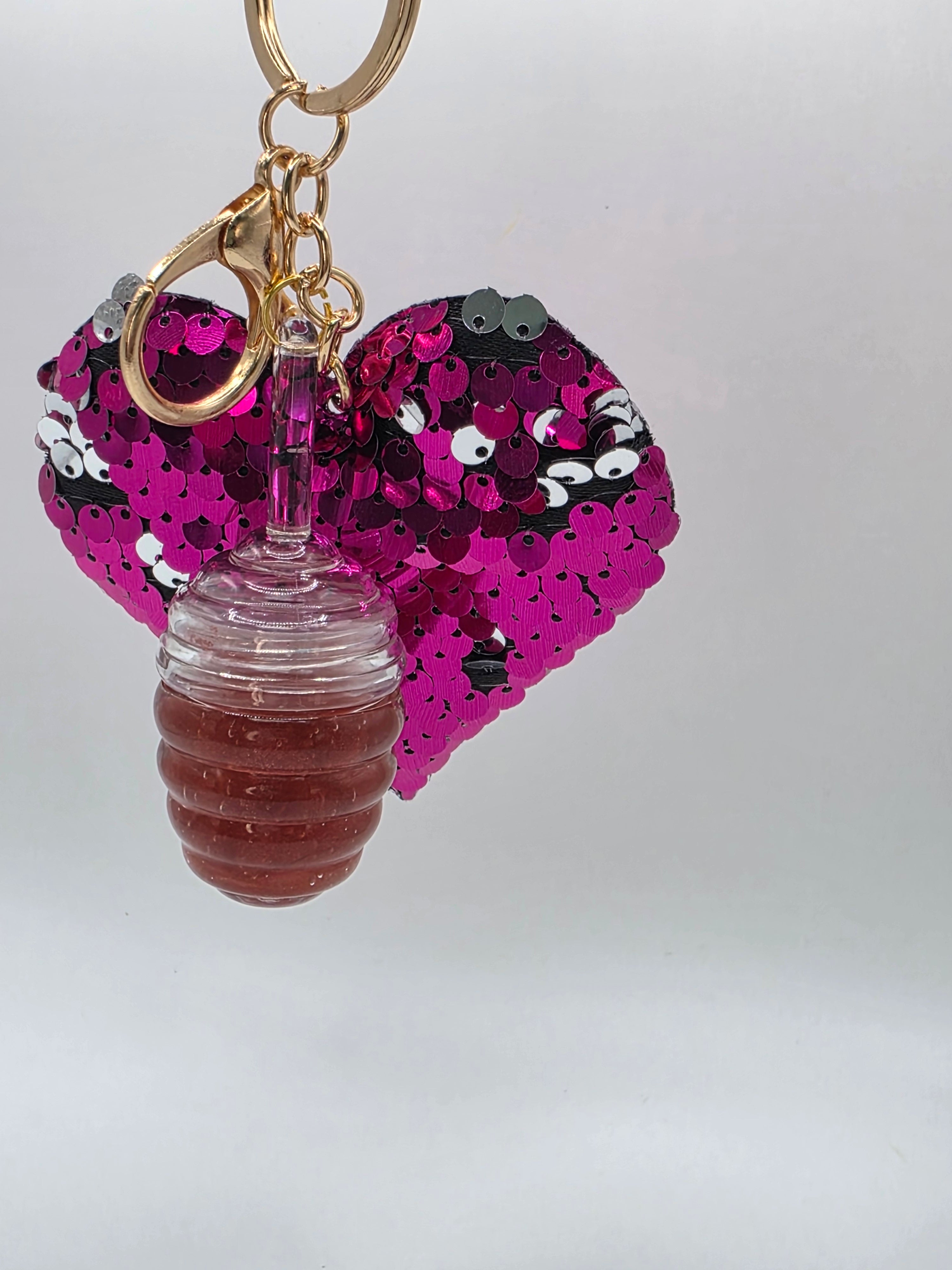 Organic repairing lip gloss with Hyaluronic Acid and Vitamin E