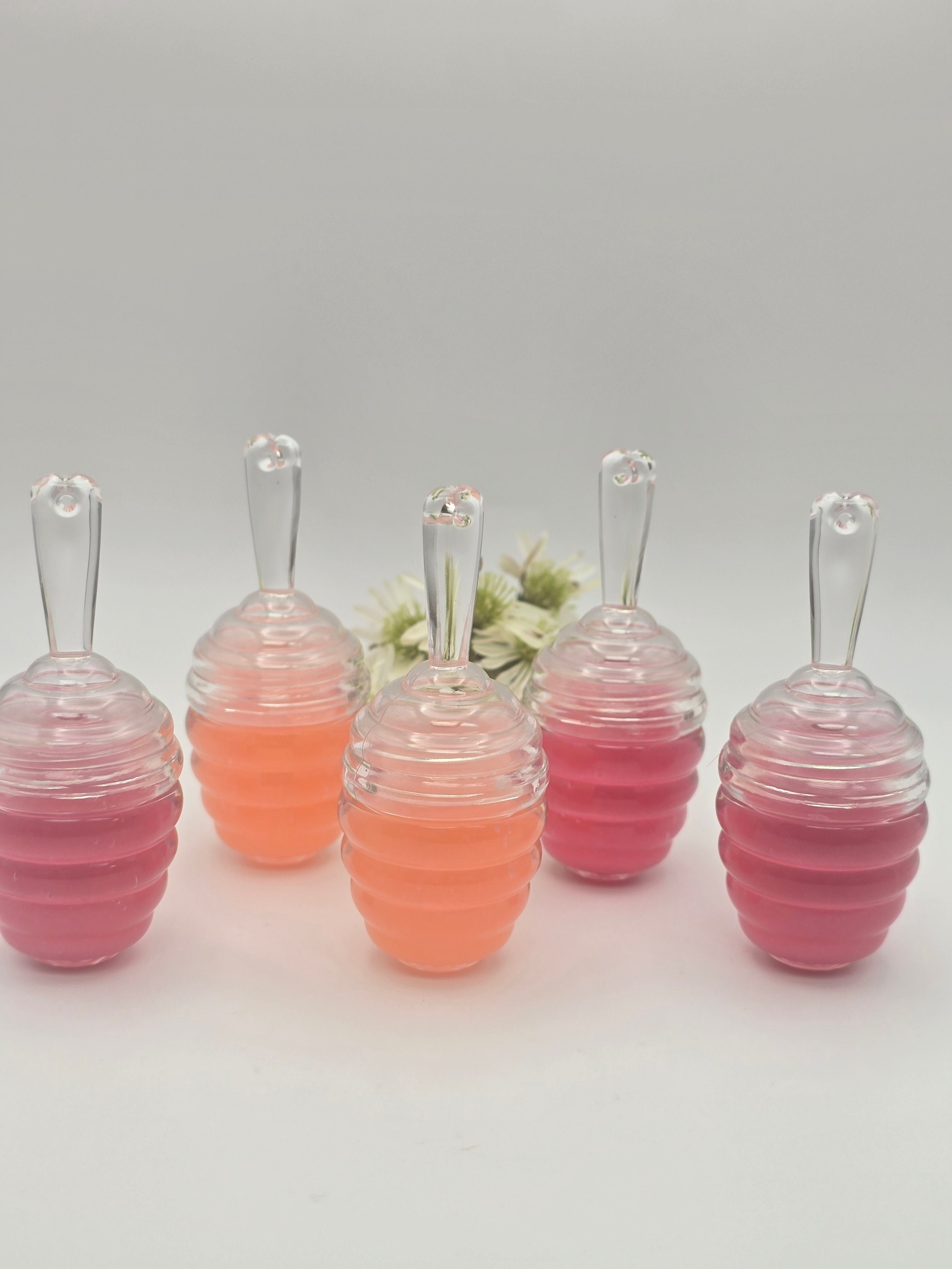 Organic repairing lip gloss with Hyaluronic Acid and Vitamin E