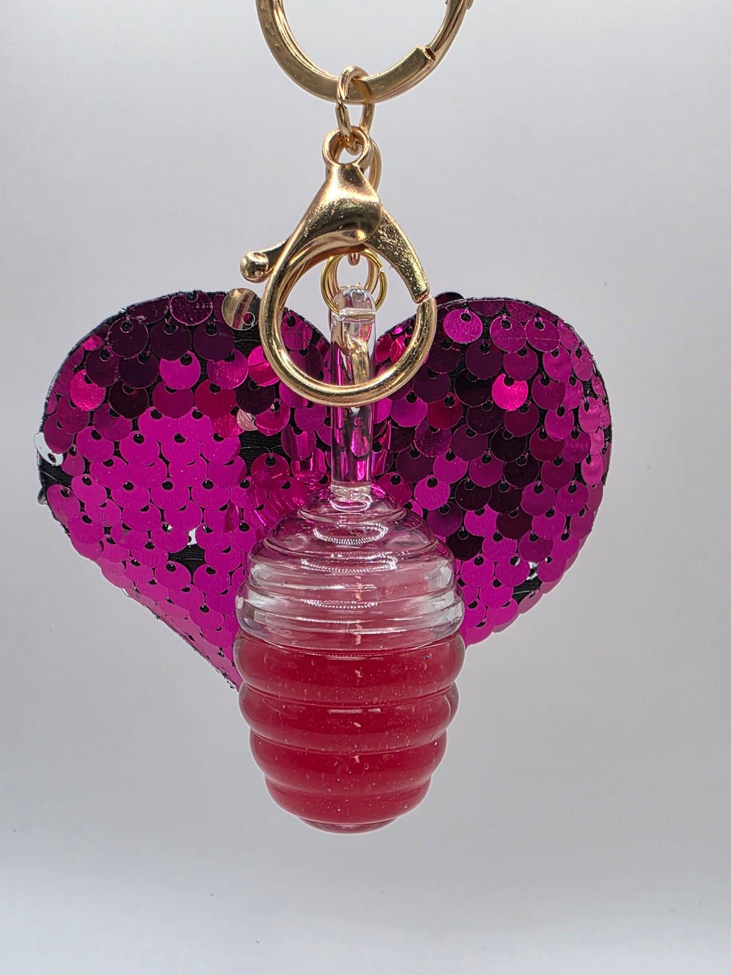 Organic repairing lip gloss with Hyaluronic Acid and Vitamin E